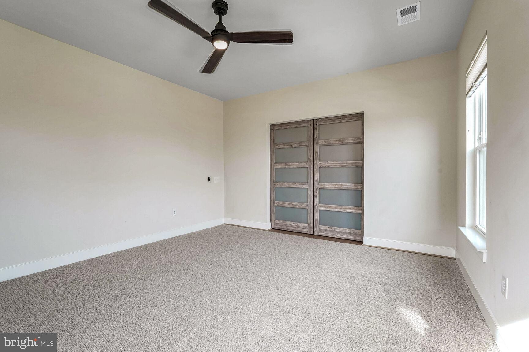 1769 Riverbluff Avenue Dumfries, VA 22026 - Photo 13 of 31 a view of an empty room with a window