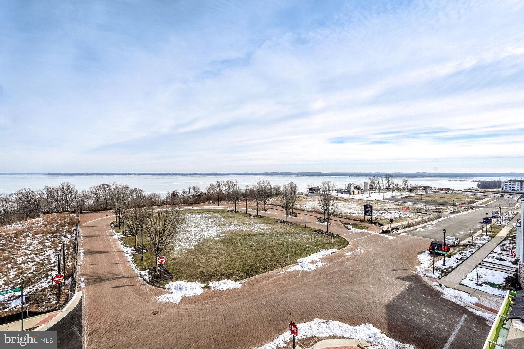 1769 Riverbluff Avenue Dumfries, VA 22026 - Photo 25 of 31 a view of a lake with a city