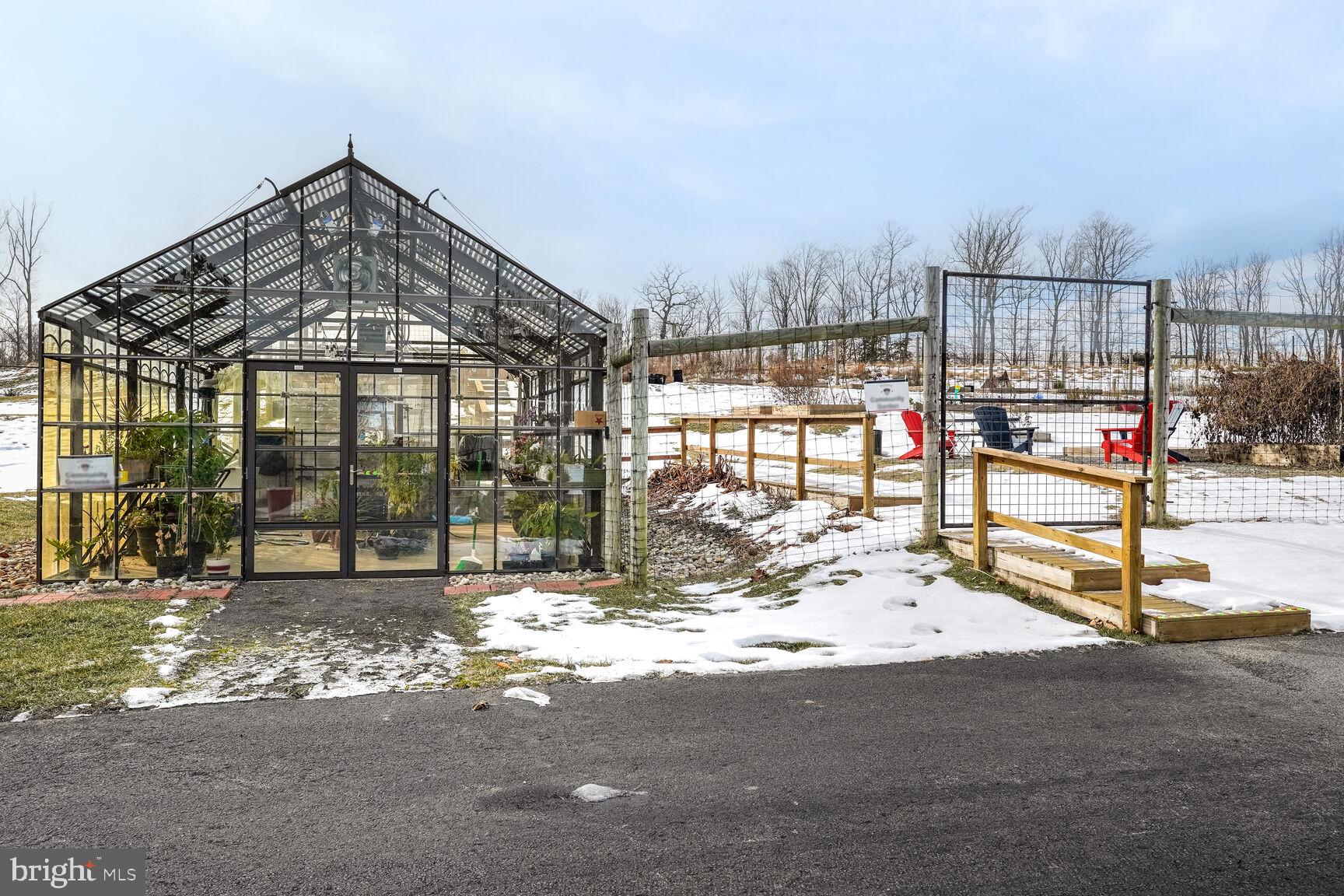 1769 Riverbluff Avenue Dumfries, VA 22026 - Photo 30 of 31 a view of a house with a park