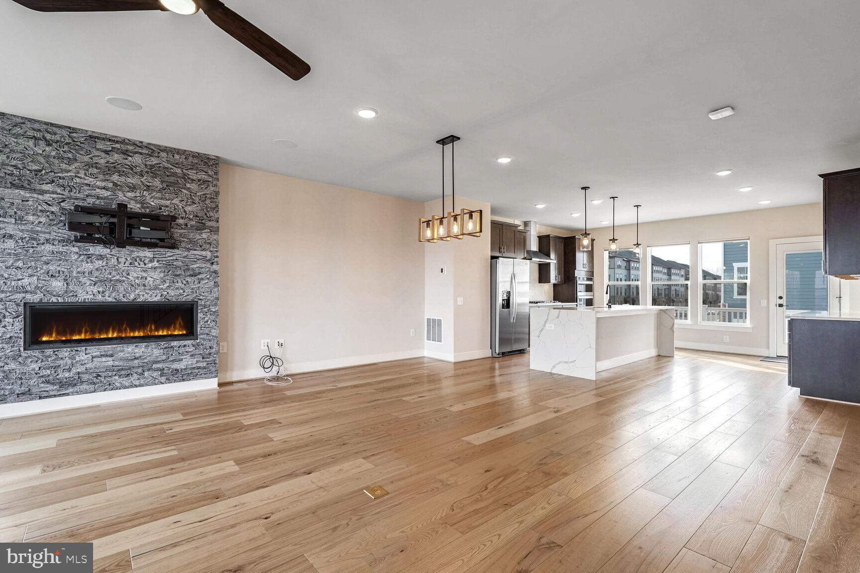 1769 Riverbluff Avenue Dumfries, VA 22026 - Photo 7 of 31 a view of kitchen with kitchen island microwave and stove top oven