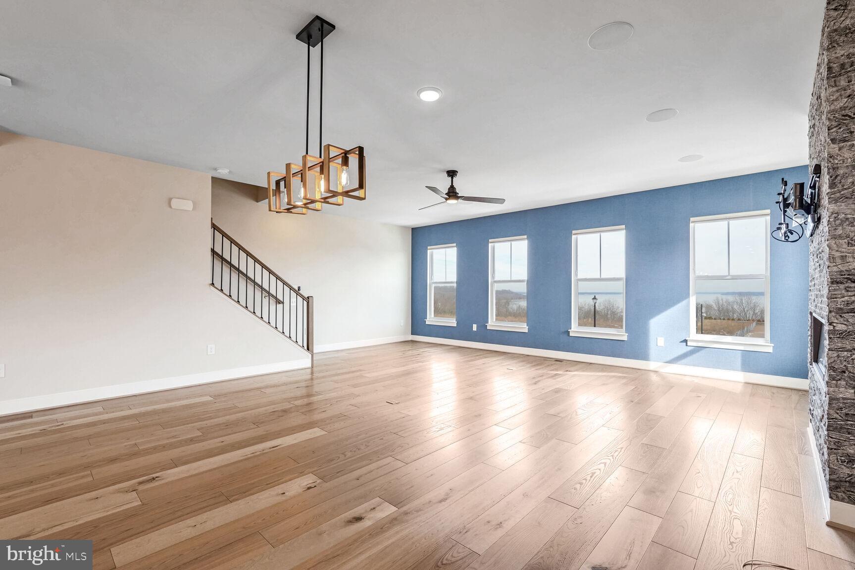 1769 Riverbluff Avenue Dumfries, VA 22026 - Photo 8 of 31 a view of empty room with wooden floor and fan