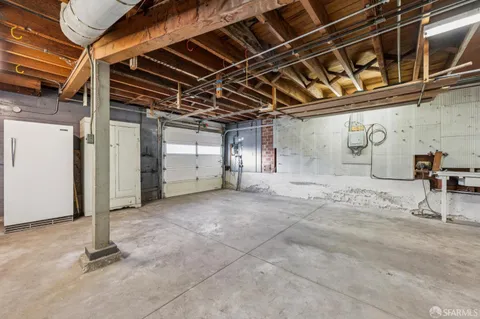 a view of a room with wooden walls