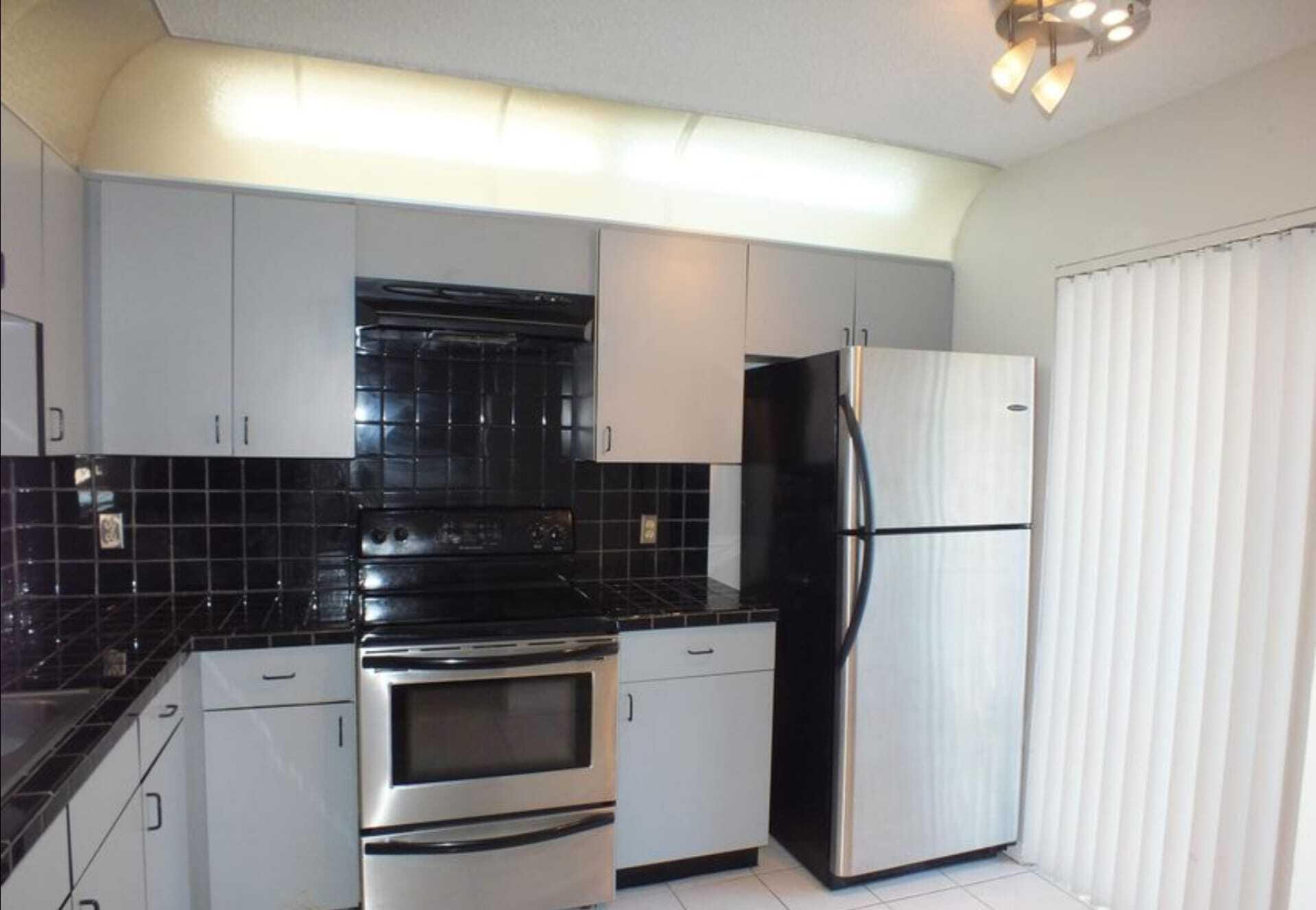 300 East Club Circle, Unit 201 Boca Raton, FL 33487 - Photo 1 of 8 Kitchen