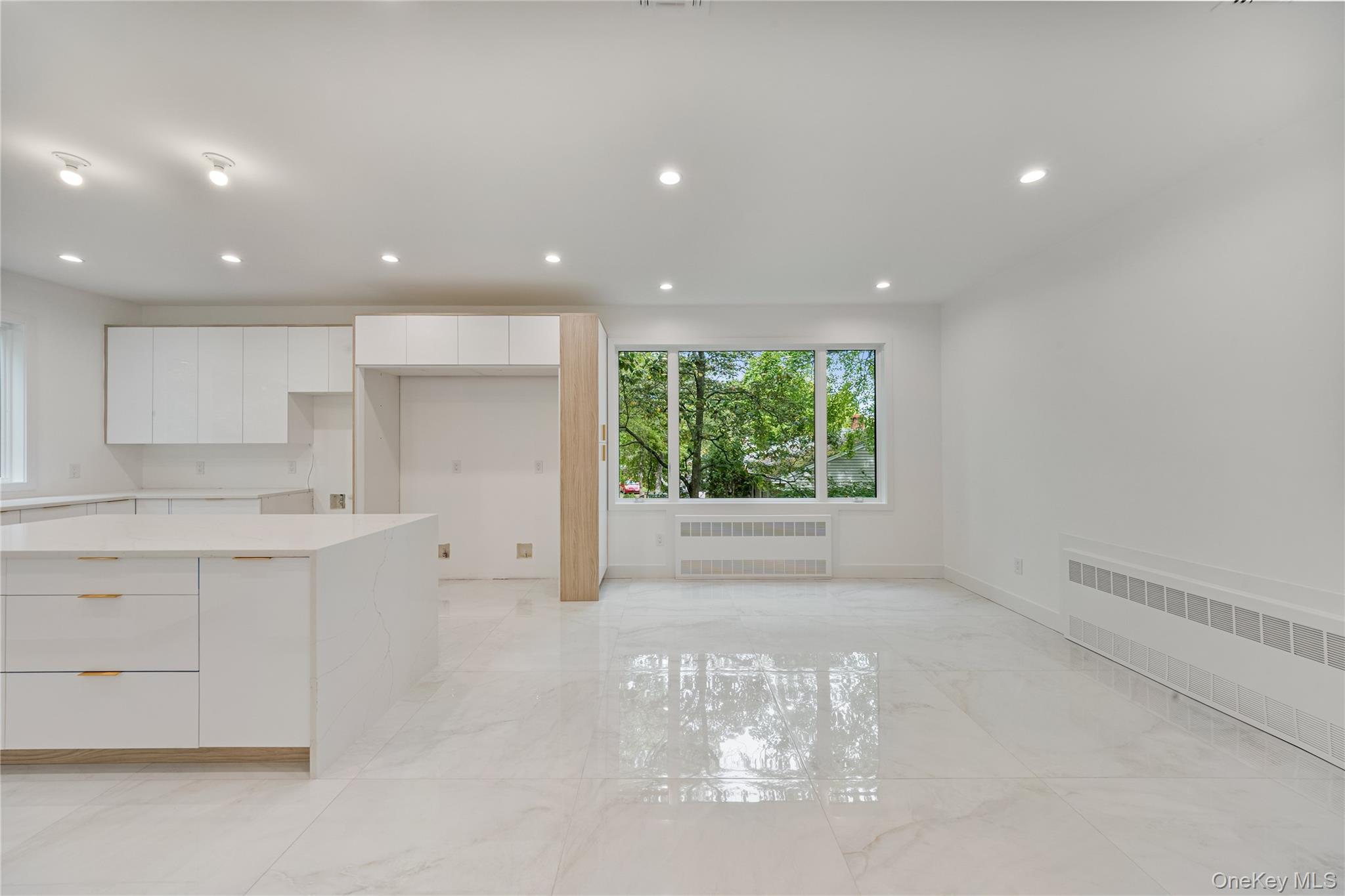 15 Northbrook Road, Unit 201 Spring Valley, NY 10977 - Photo 11 of 50 a large kitchen with stainless steel appliances a large window
