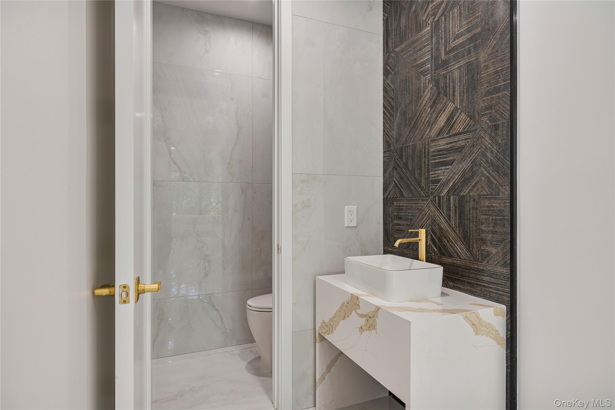 15 Northbrook Road, Unit 201 Spring Valley, NY 10977 - Photo 13 of 50 a bathroom with a sink and toilet