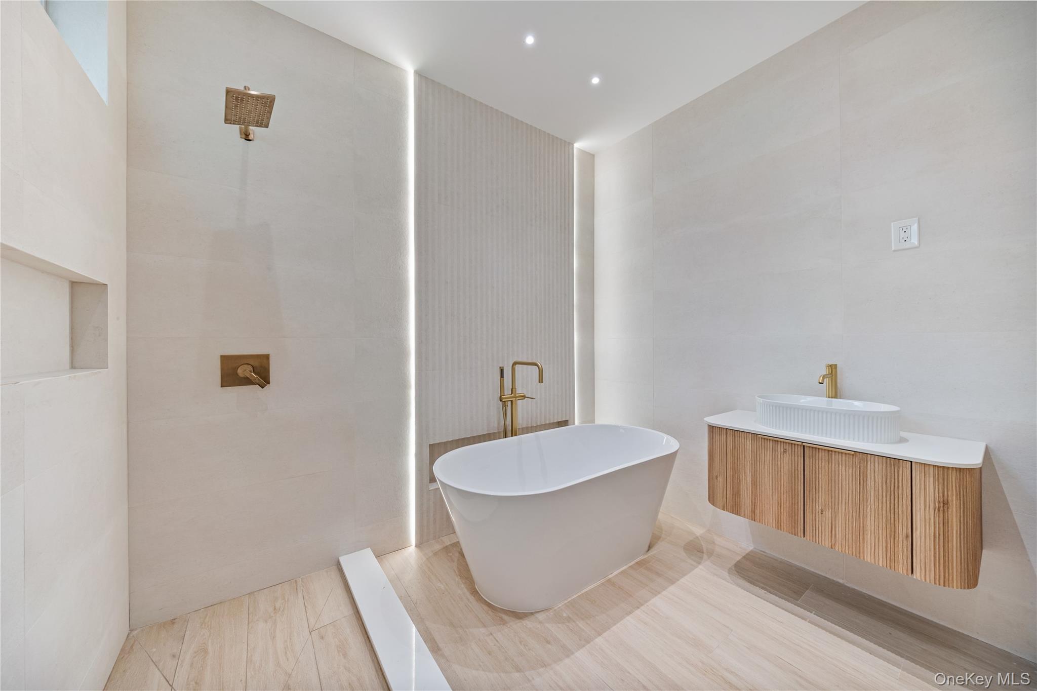 15 Northbrook Road, Unit 201 Spring Valley, NY 10977 - Photo 21 of 50 a bathroom with a white tub shower