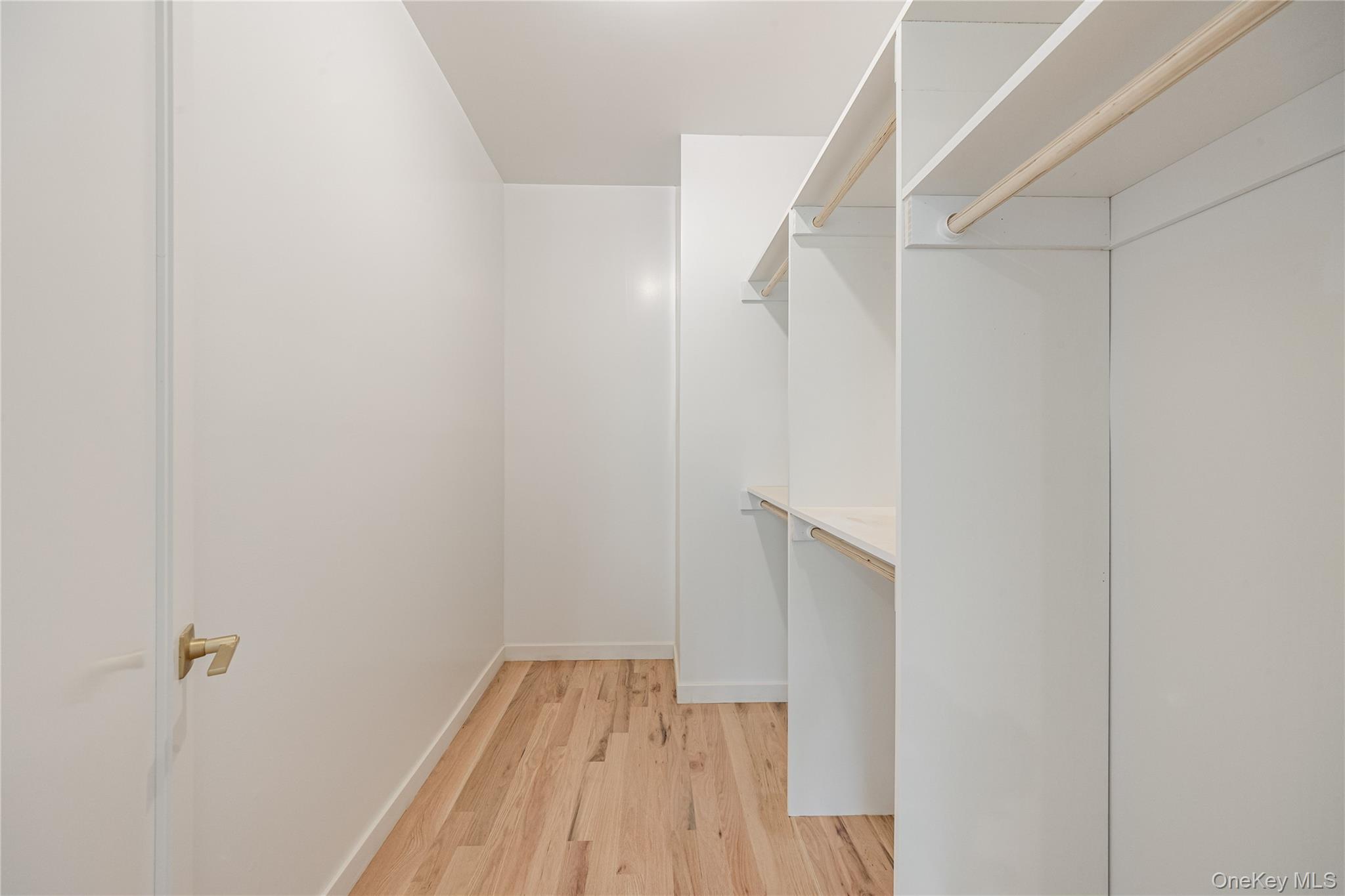 15 Northbrook Road, Unit 201 Spring Valley, NY 10977 - Photo 23 of 50 a view of a hallway with wooden floor