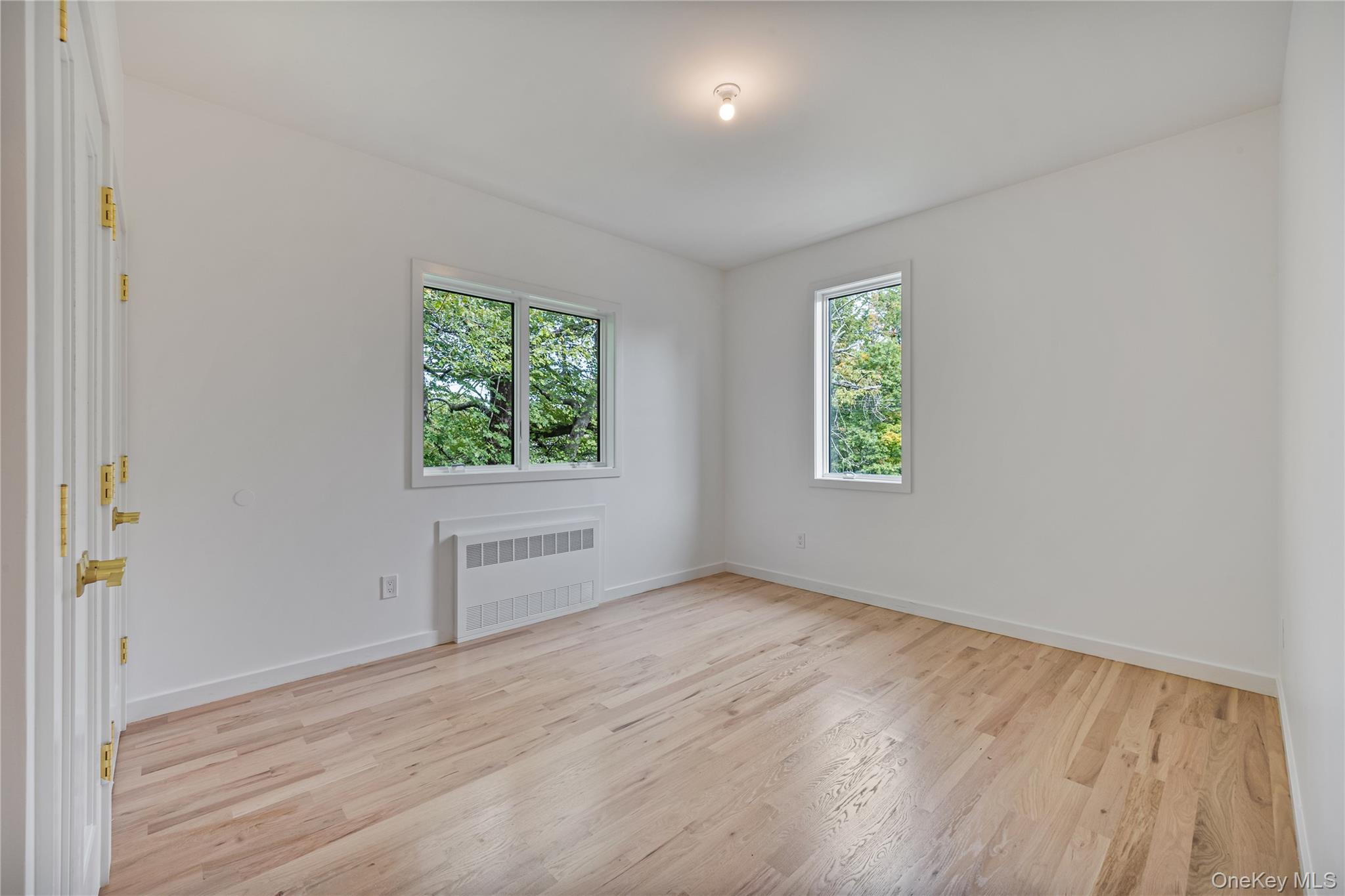 15 Northbrook Road, Unit 201 Spring Valley, NY 10977 - Photo 28 of 50 an empty room with windows