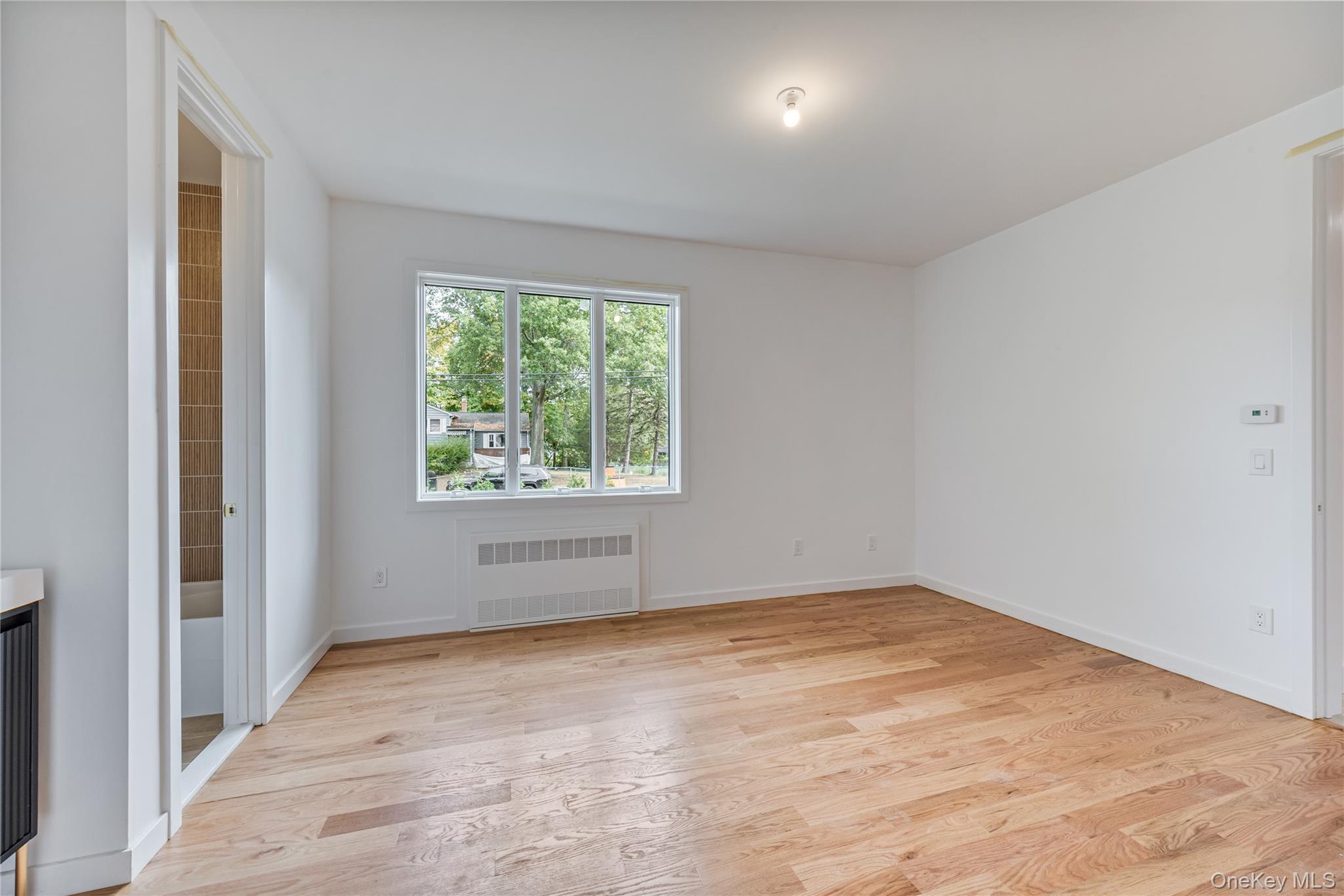 15 Northbrook Road, Unit 201 Spring Valley, NY 10977 - Photo 34 of 50 an empty room with a window