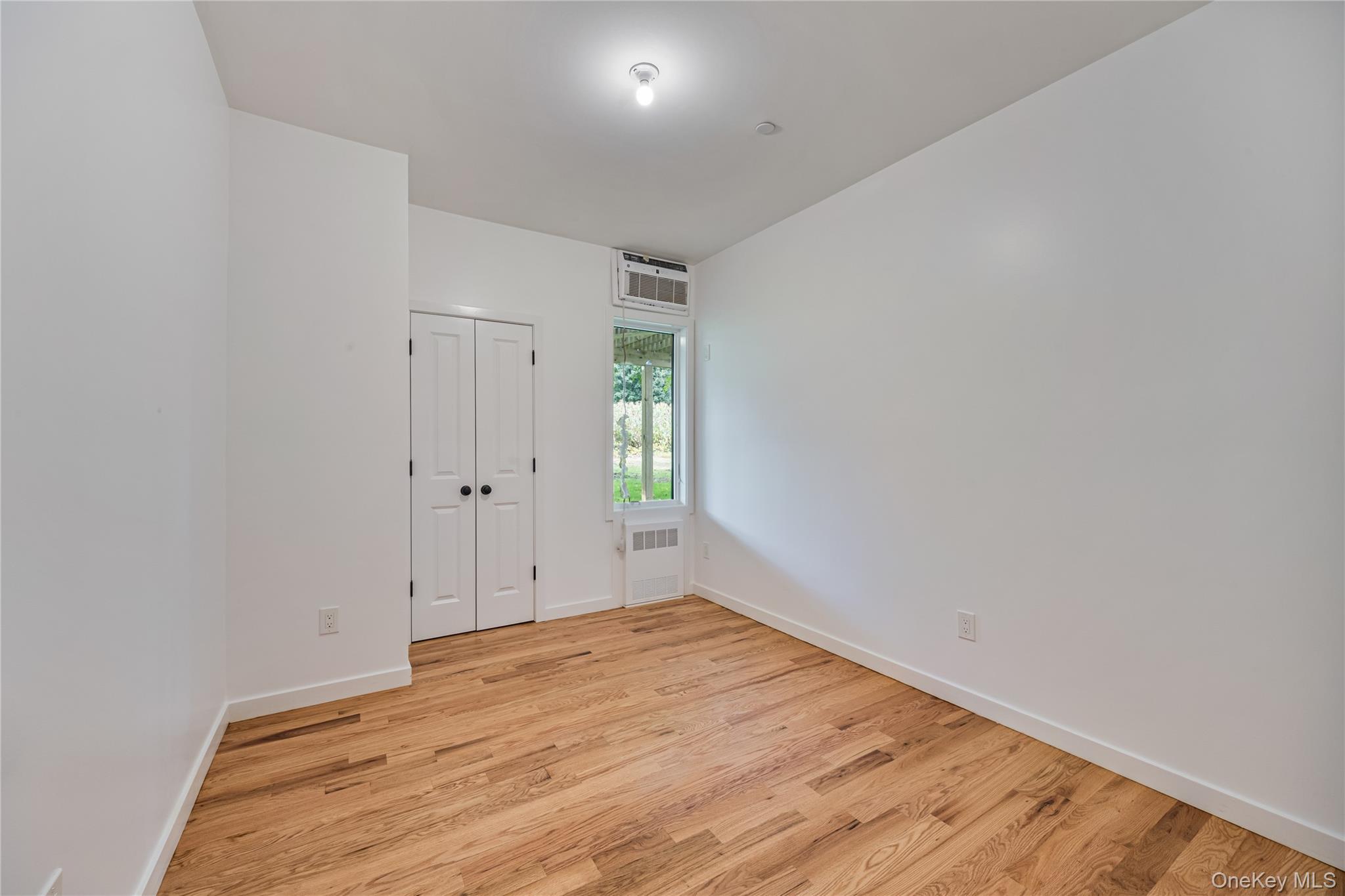 15 Northbrook Road, Unit 201 Spring Valley, NY 10977 - Photo 42 of 50 a view of empty room with wooden floor