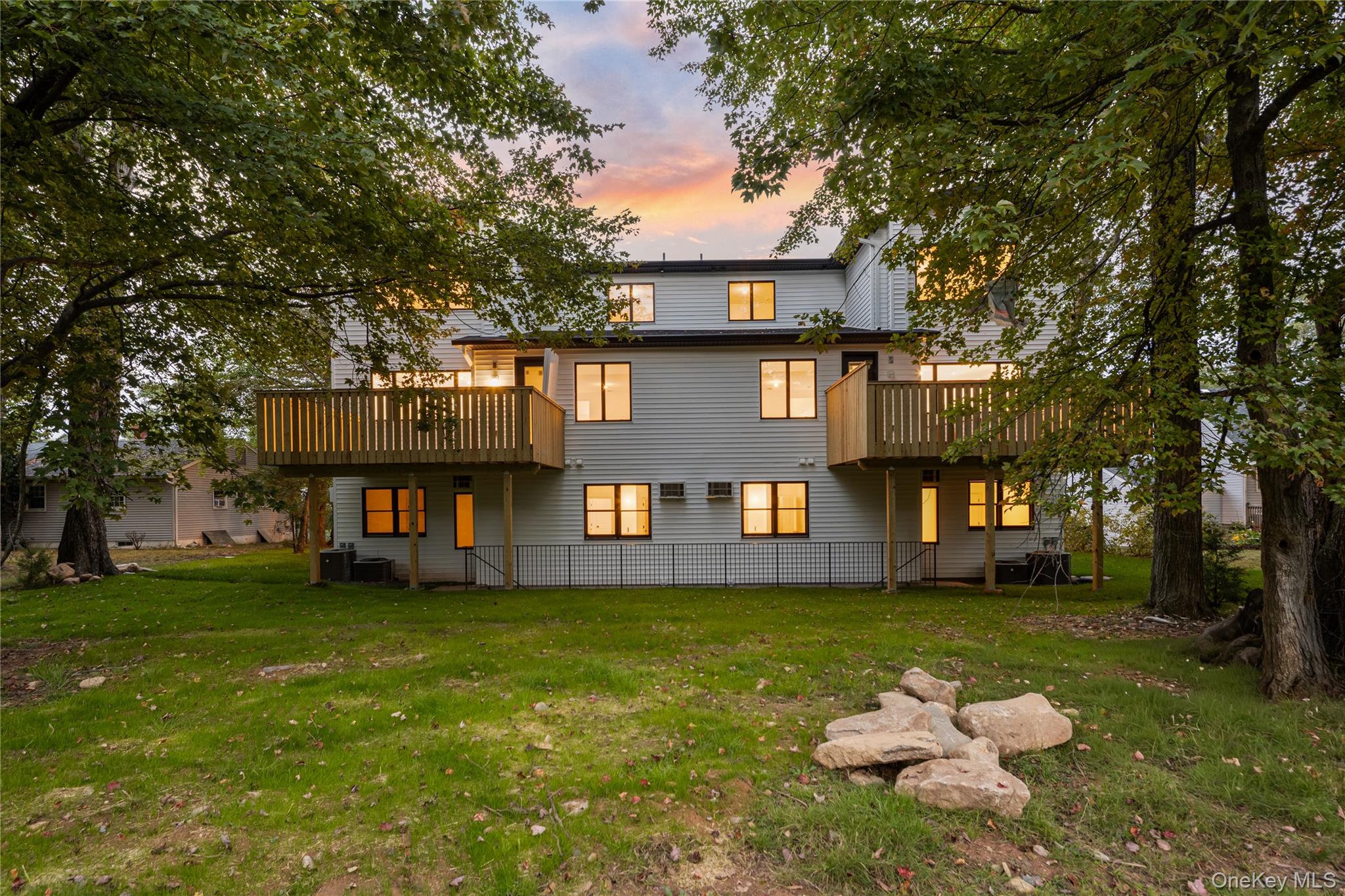 15 Northbrook Road, Unit 201 Spring Valley, NY 10977 - Photo 49 of 50 a front view of a building with a garden