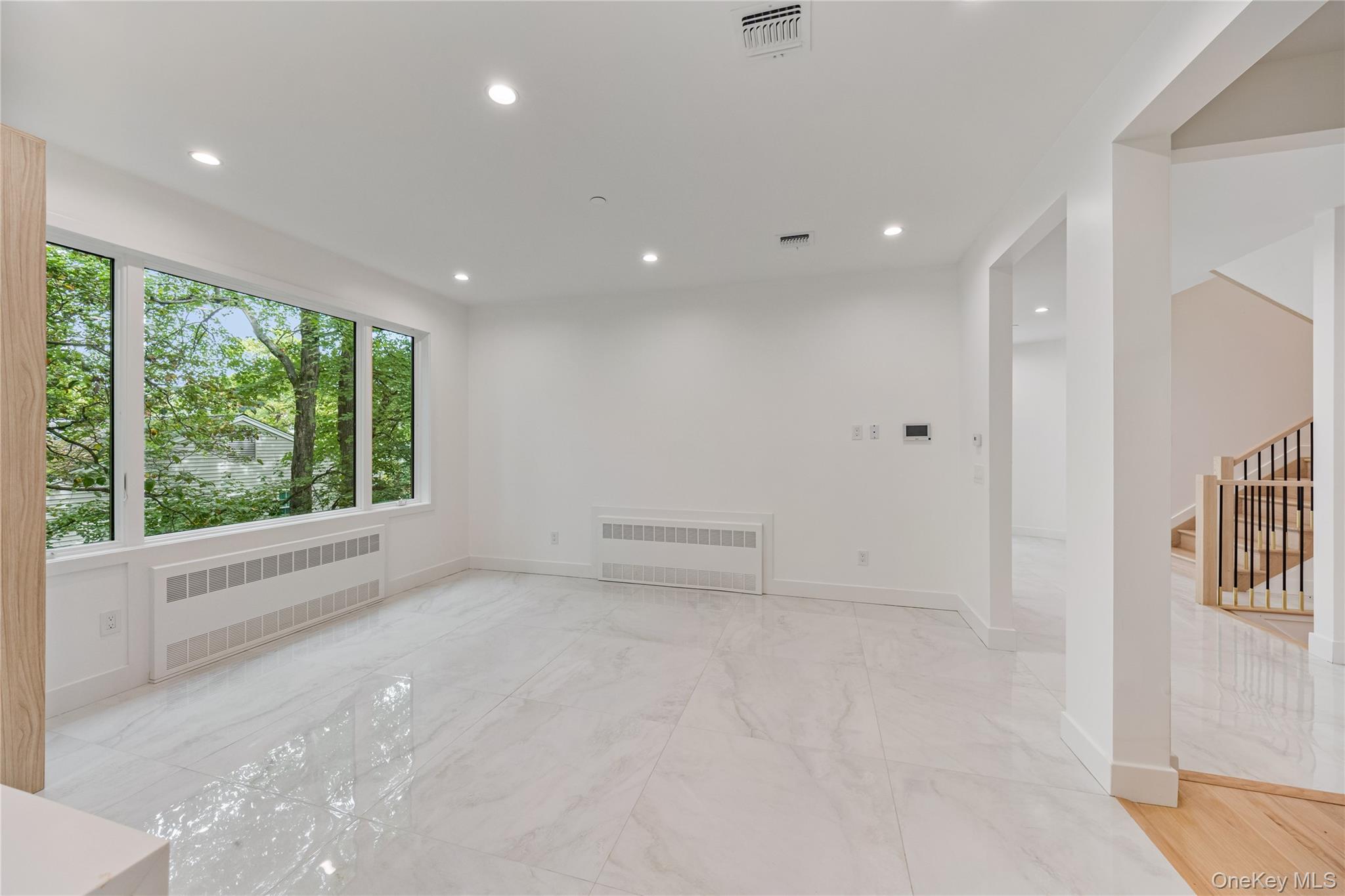 15 Northbrook Road, Unit 201 Spring Valley, NY 10977 - Photo 10 of 50 a view of empty room with wooden floor and fan