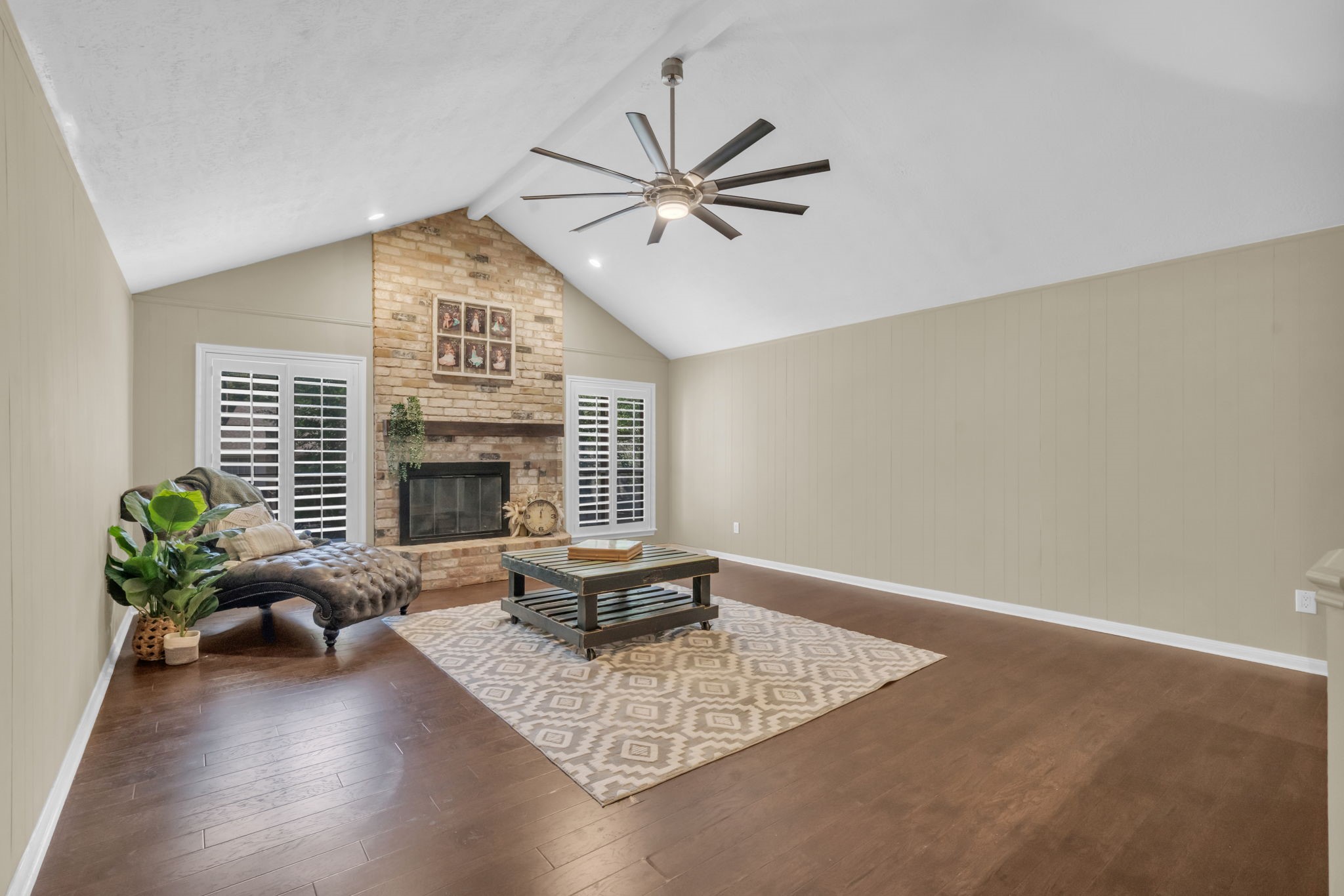 6514 Larkmount Drive Spring, TX 77389 - Photo 32 of 41 The expansive upstairs flex space offers endless possibilities for work , play or relaxation around the brick fireplace.