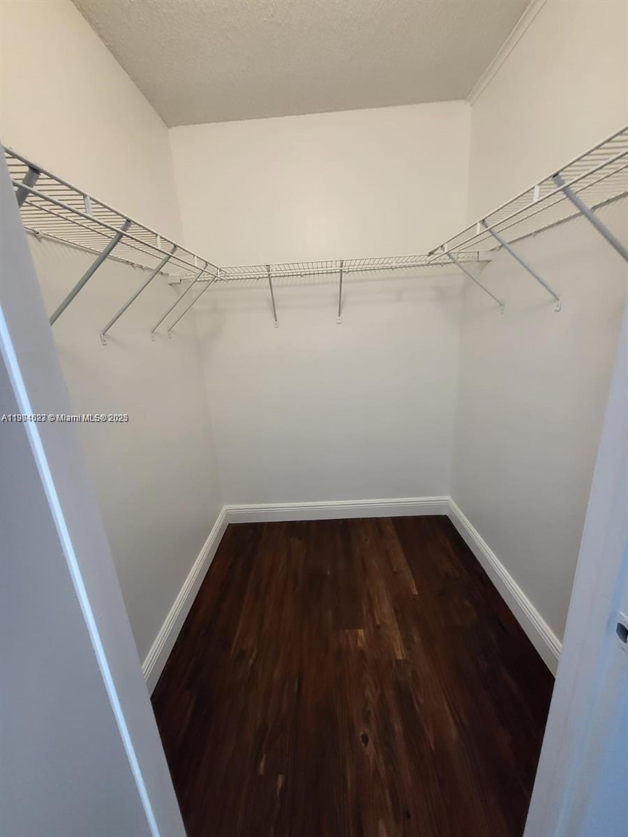 5654 Rock Island Road, Unit 222 Tamarac, FL 33319 - Photo 14 of 21 a view of a room with racks on the wall