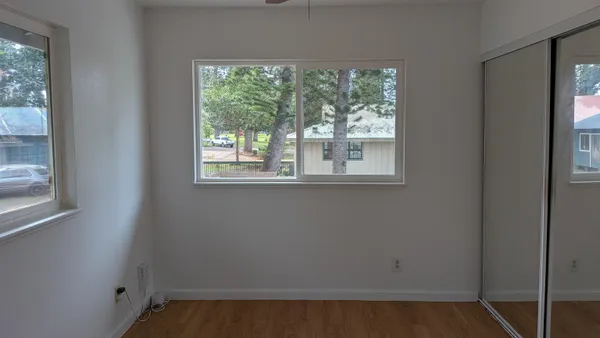 a view of a room that has a window in it