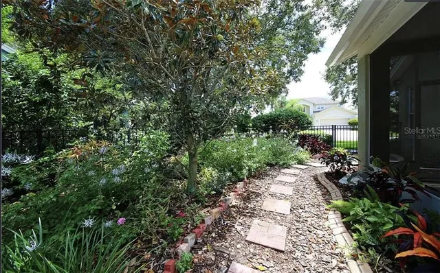a view of a back yard of the house