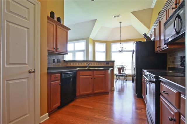 1082 Nealcrest Circle Spring Hill, TN 37174 - Photo 4 of 8 Kitchen has lots of counter space for all your food preparation.