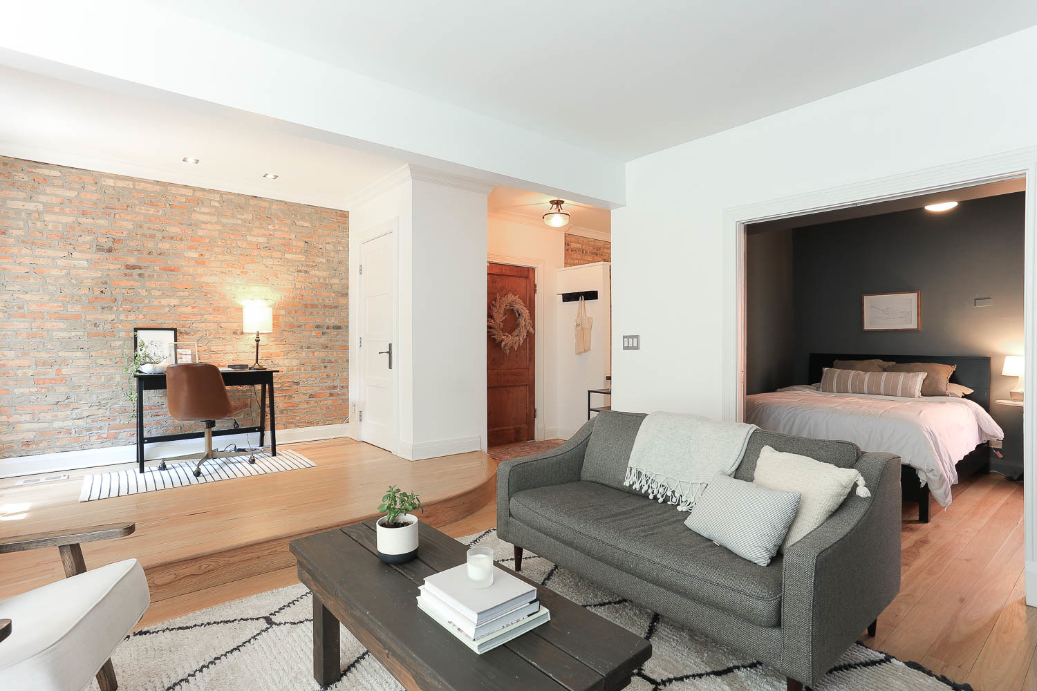 2026 North Howe Street, Unit 1 Chicago, IL 60614 - Photo 16 of 40 a living room with furniture and wooden floor