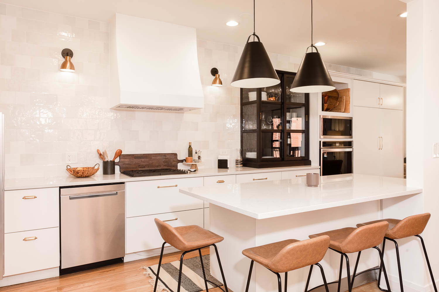 2026 North Howe Street, Unit 1 Chicago, IL 60614 - Photo 2 of 40 a kitchen with stainless steel appliances kitchen island a stove and white cabinets