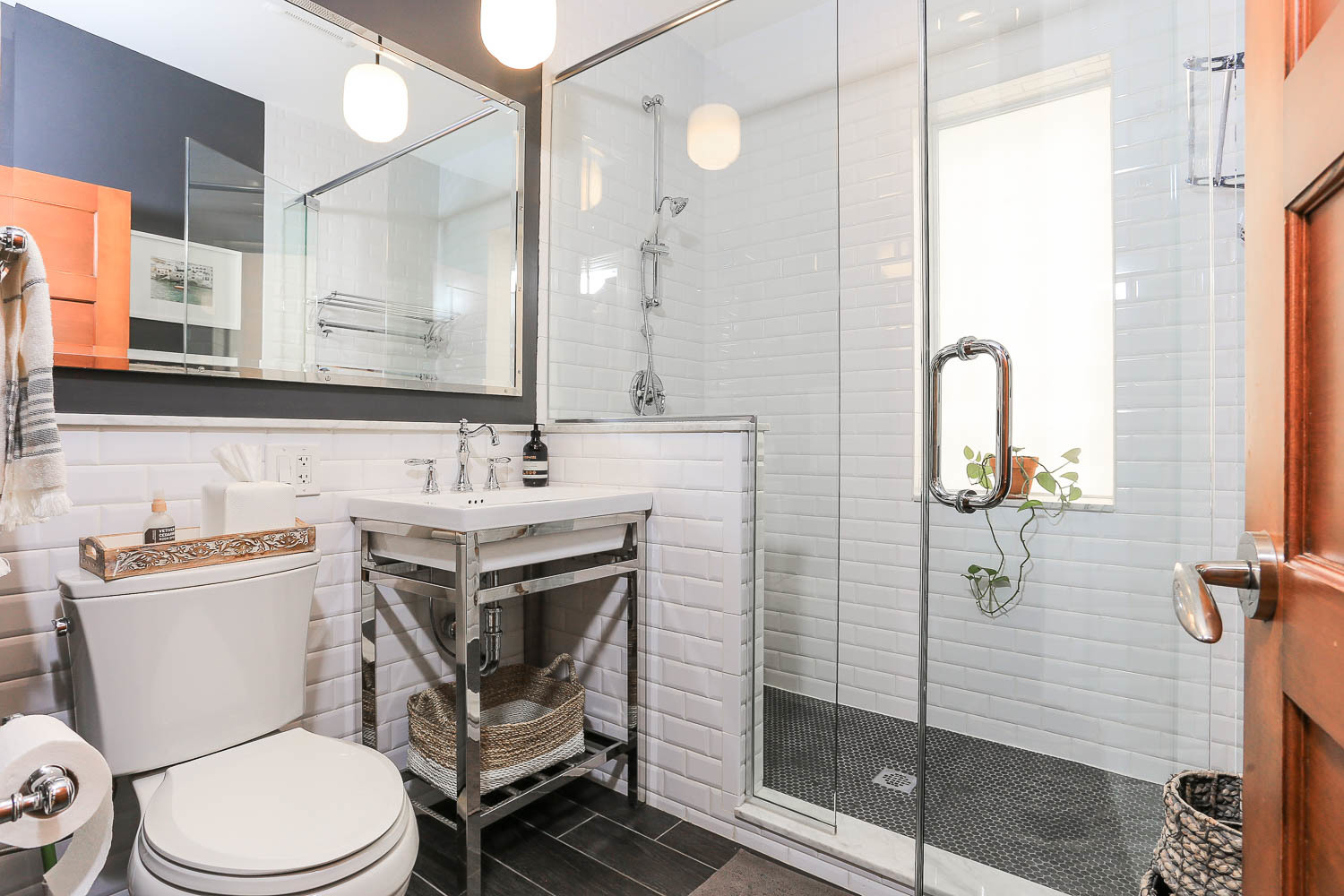 2026 North Howe Street, Unit 1 Chicago, IL 60614 - Photo 24 of 40 a bathroom with a sink toilet vanity and shower
