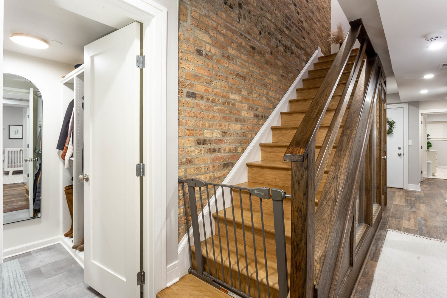 2026 North Howe Street, Unit 1 Chicago, IL 60614 - Photo 25 of 40 a view of staircase with railing and white walls