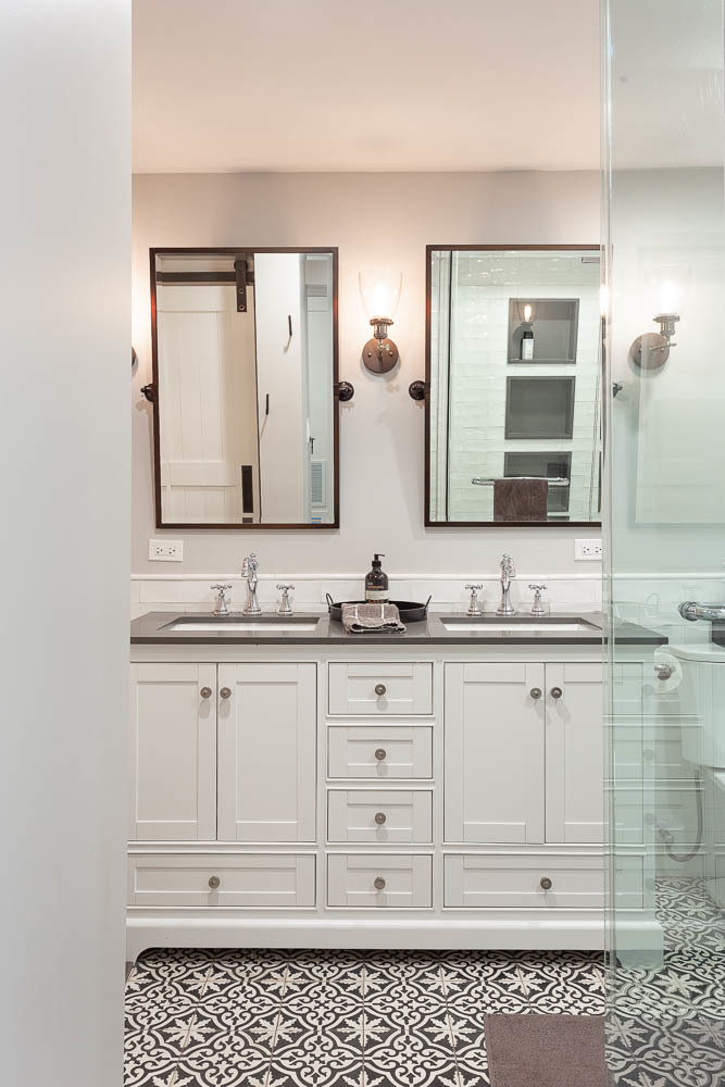 2026 North Howe Street, Unit 1 Chicago, IL 60614 - Photo 31 of 40 a bathroom with a sink vanity and mirror