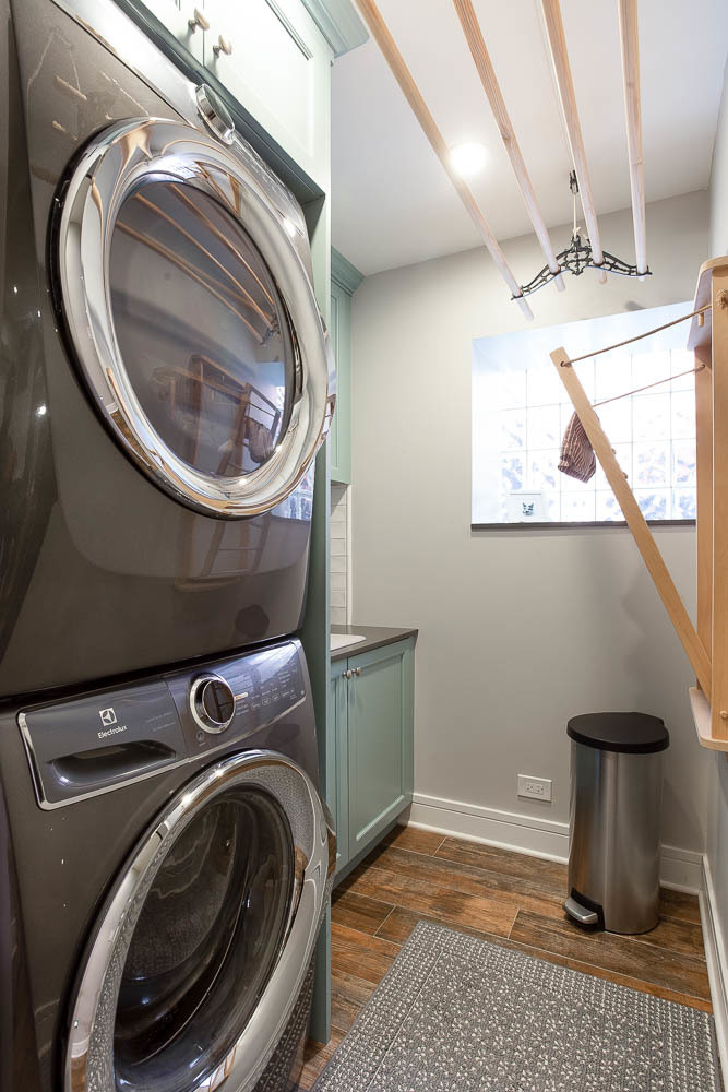 2026 North Howe Street, Unit 1 Chicago, IL 60614 - Photo 35 of 40 a utility room with a sink dryer and washer