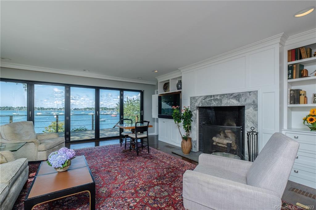 10 Morgan Point Groton, CT 06340 - Photo 12 of 40 a living room with furniture and a fireplace