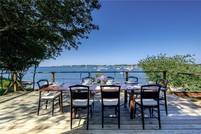 a patio with table and chairs