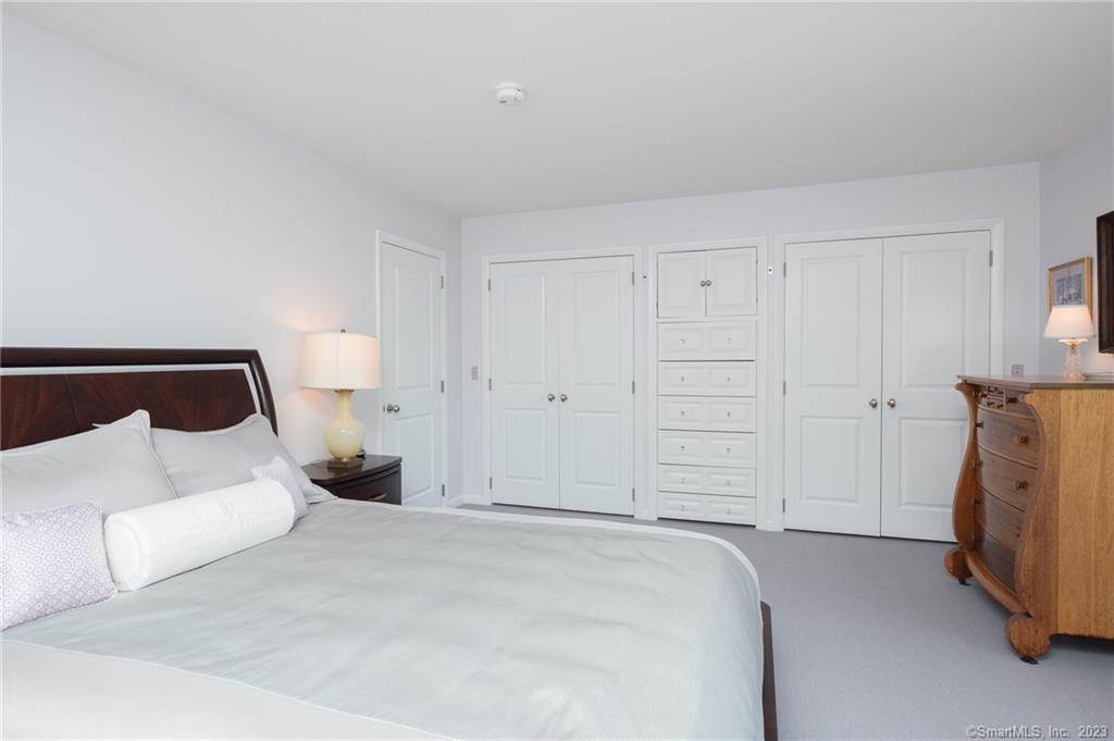 10 Morgan Point Groton, CT 06340 - Photo 19 of 40 a bedroom with a bed and a couch