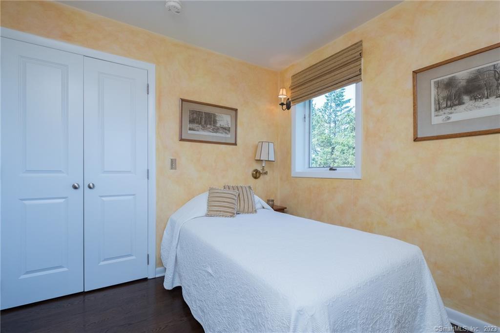10 Morgan Point Groton, CT 06340 - Photo 21 of 40 a bedroom with a bed and a window
