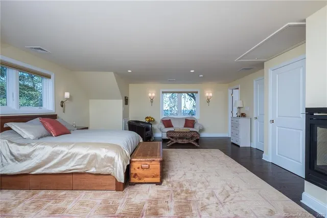 a bathroom with a sink vanity and mirror