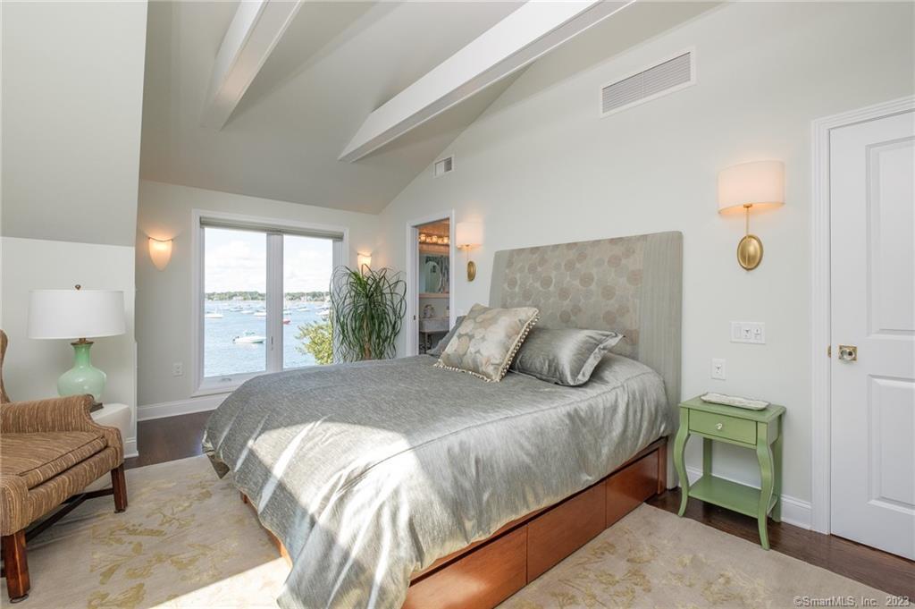 10 Morgan Point Groton, CT 06340 - Photo 29 of 40 a bedroom with a bed and a large window