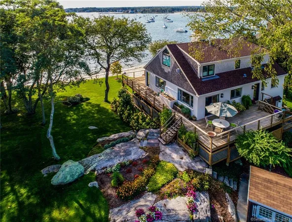 an aerial view of a house with a garden