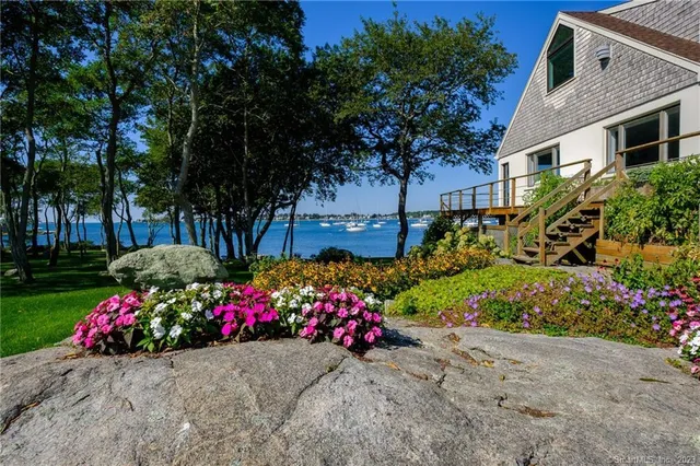 a view of street with flower and trees