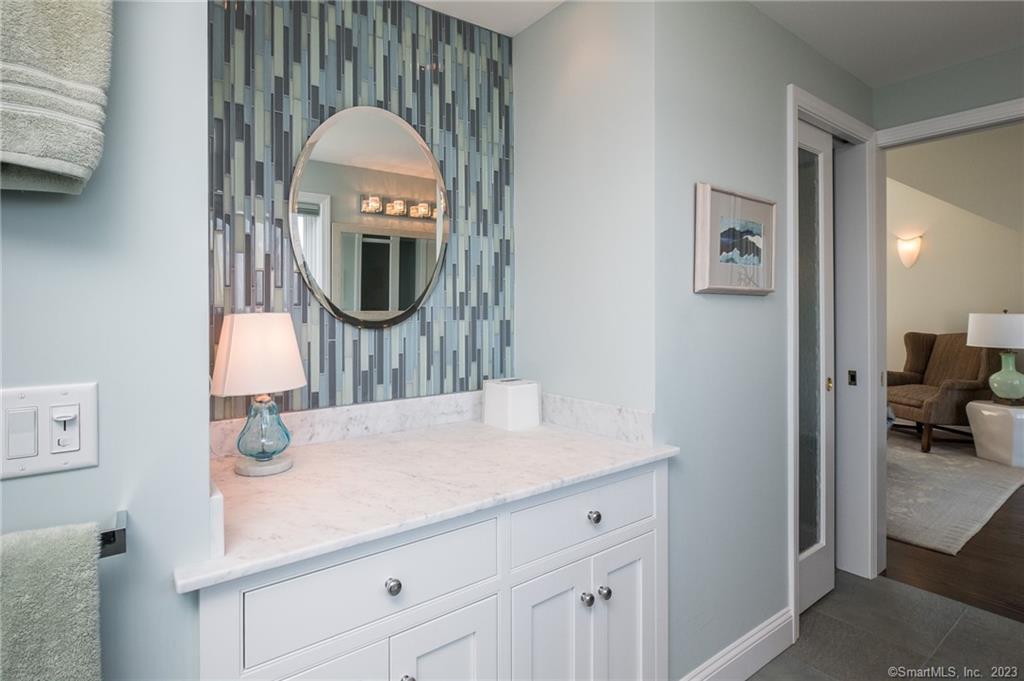 10 Morgan Point Groton, CT 06340 - Photo 32 of 40 a en suite bathroom with a sink and a mirror
