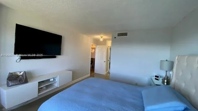 a view of a livingroom with a flat screen tv