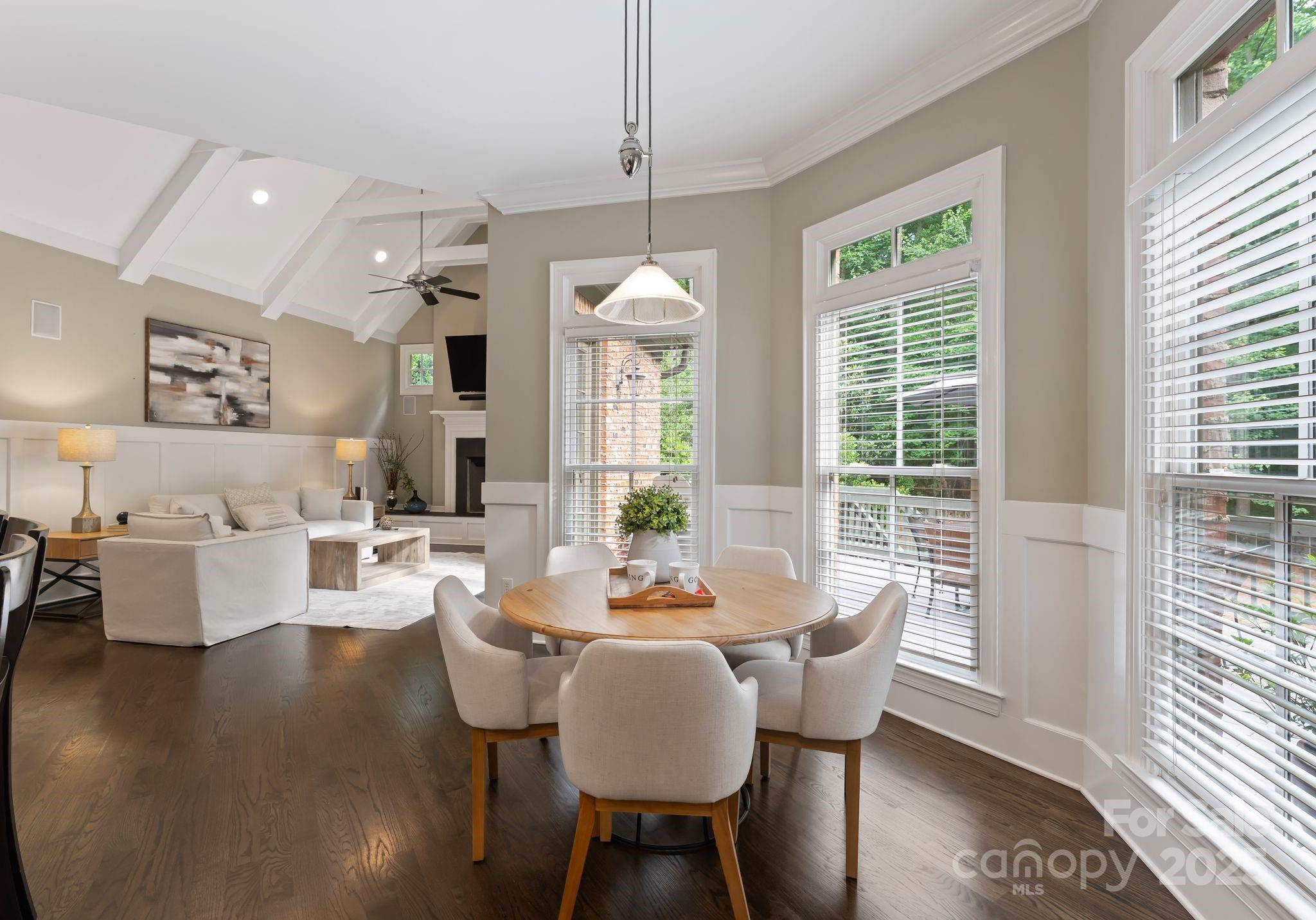 408 Covington Crossing Matthews, NC 28104 - Photo 15 of 46 a dining room with furniture window wooden floor