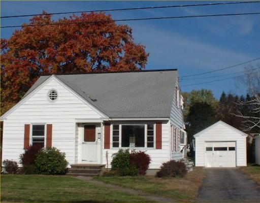 51 Ruggles Street Three Rivers, MA 01080 - Photo 1 of 1 a front view of a house with a yard