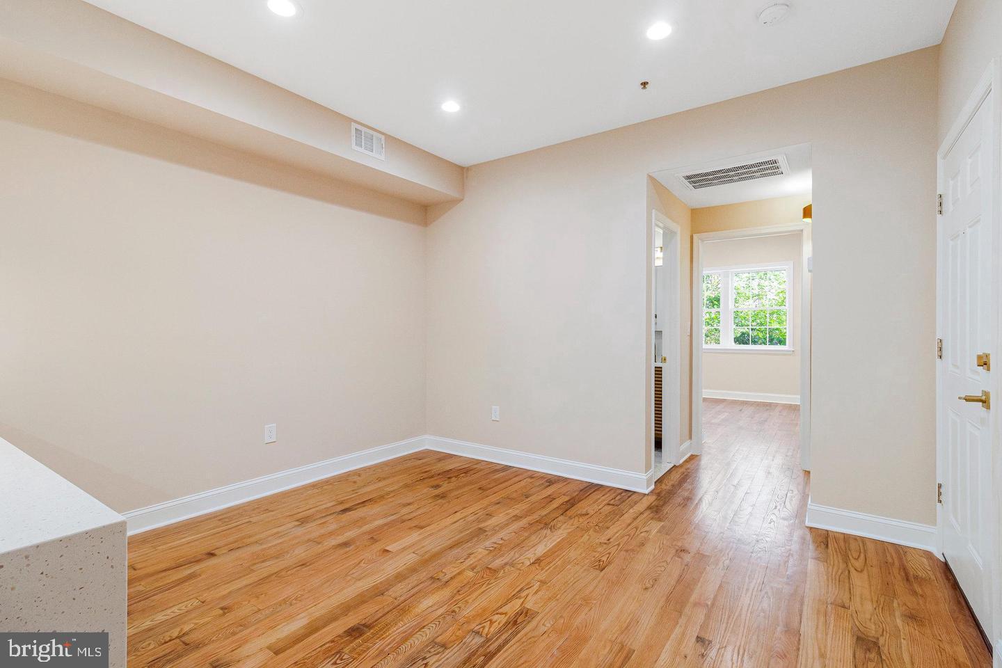 1609 17th Street Southeast, Unit 202 Washington, DC 20020 - Photo 12 of 19 a view of a room with wooden floor