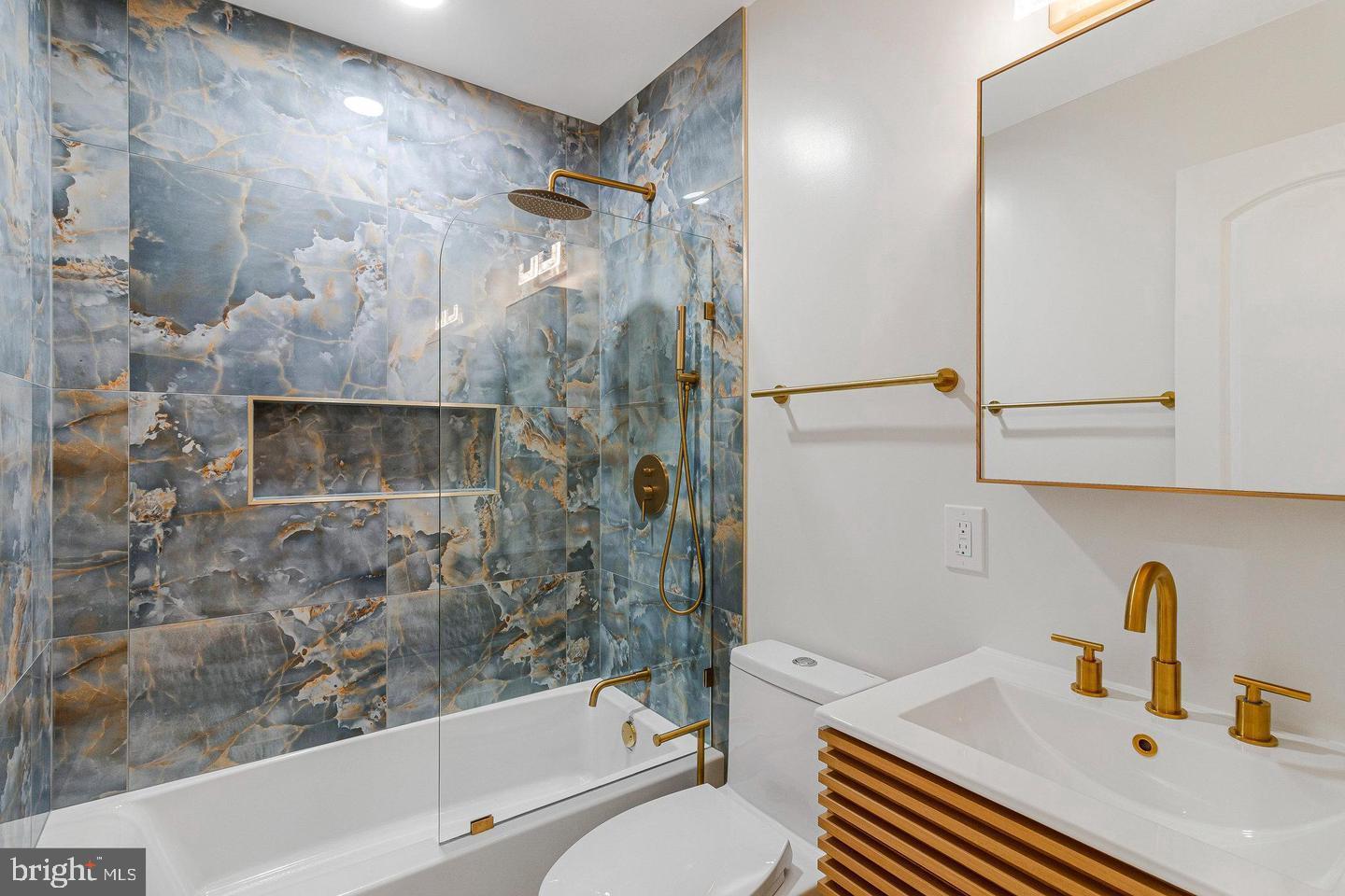 1609 17th Street Southeast, Unit 202 Washington, DC 20020 - Photo 18 of 19 a bathroom with a sink and a bathtub