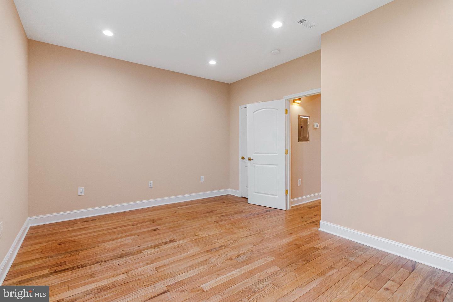 1609 17th Street Southeast, Unit 202 Washington, DC 20020 - Photo 8 of 19 wooden floor in an empty room