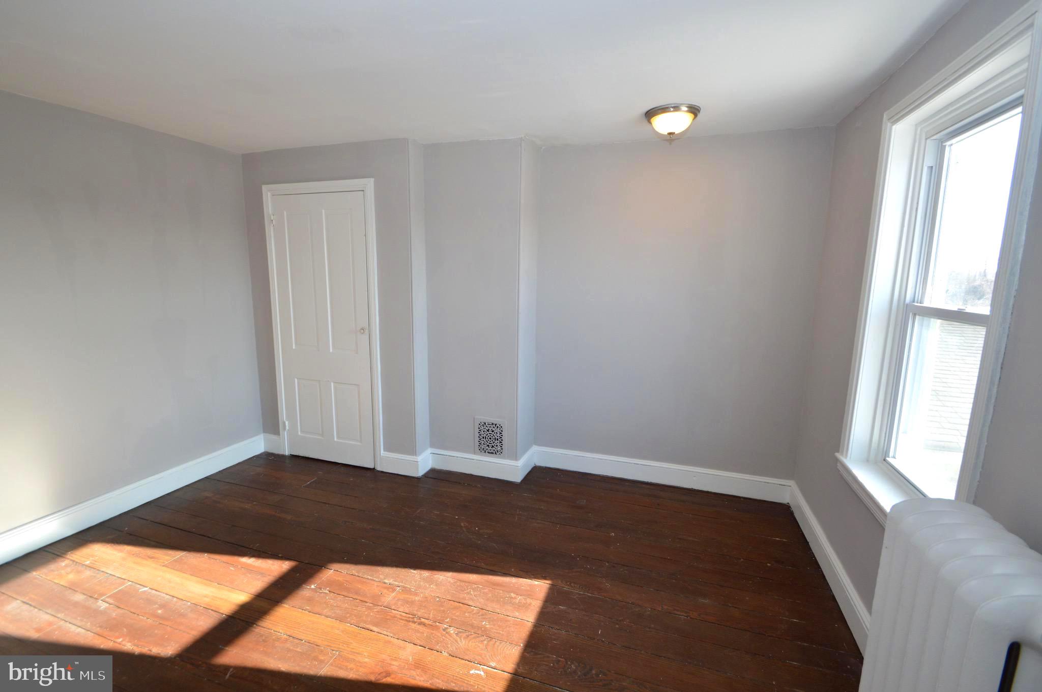 348 Barclay Street Burlington, NJ 08016 - Photo 18 of 21 an empty room with a window