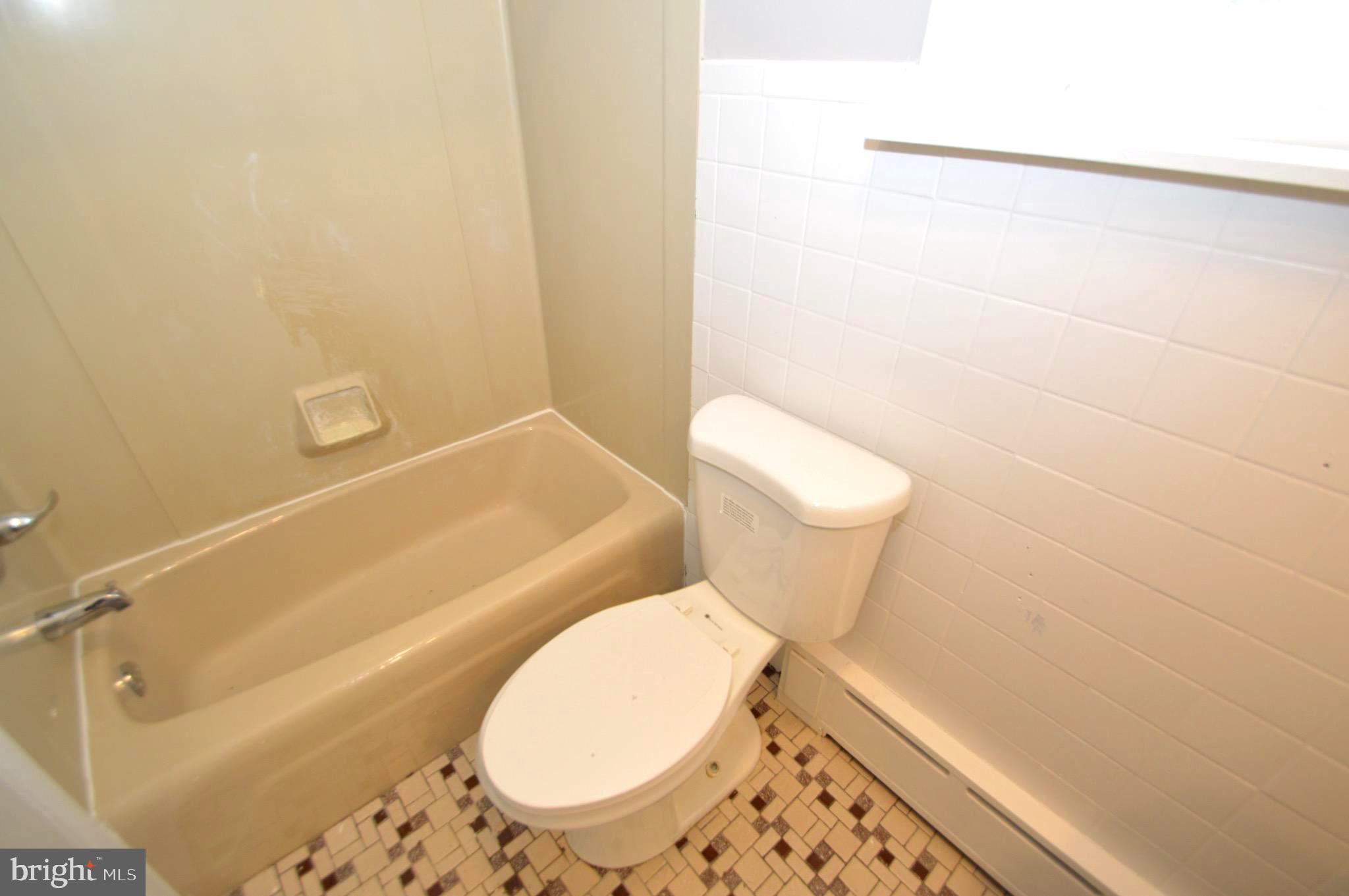 348 Barclay Street Burlington, NJ 08016 - Photo 21 of 21 a bathroom with a toilet and a shower