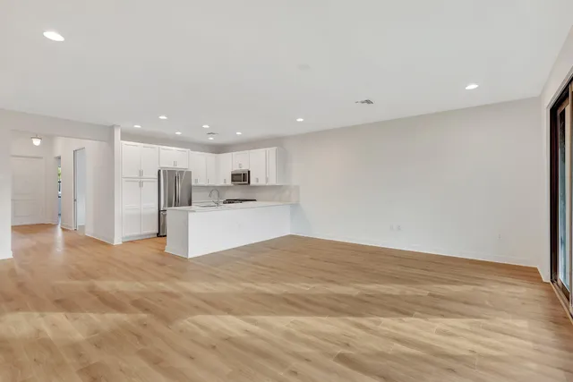 a kitchen with sink and window