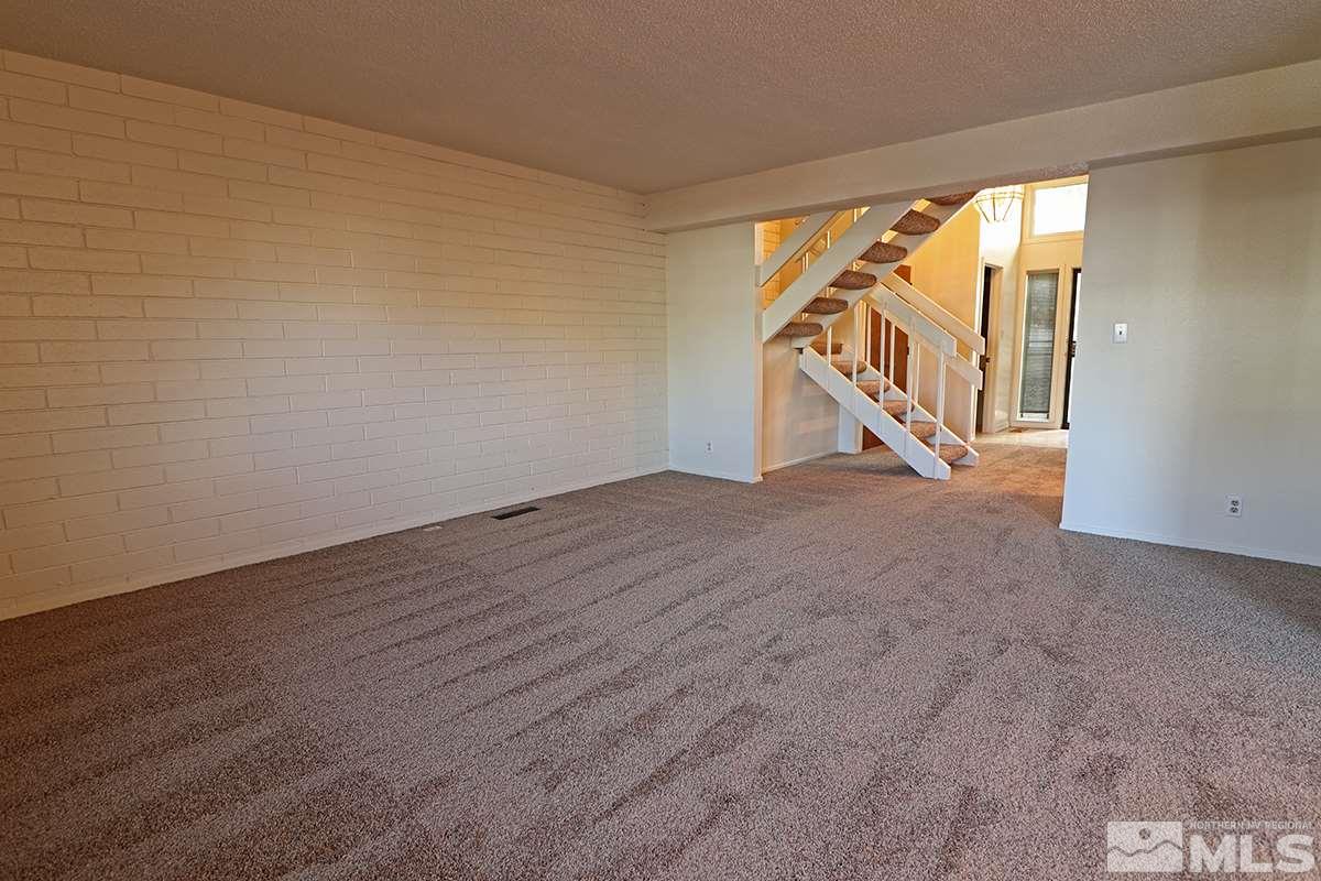 4012 Ruth Court Reno, NV 89509 - Photo 9 of 17 a view of an empty room with a staircase
