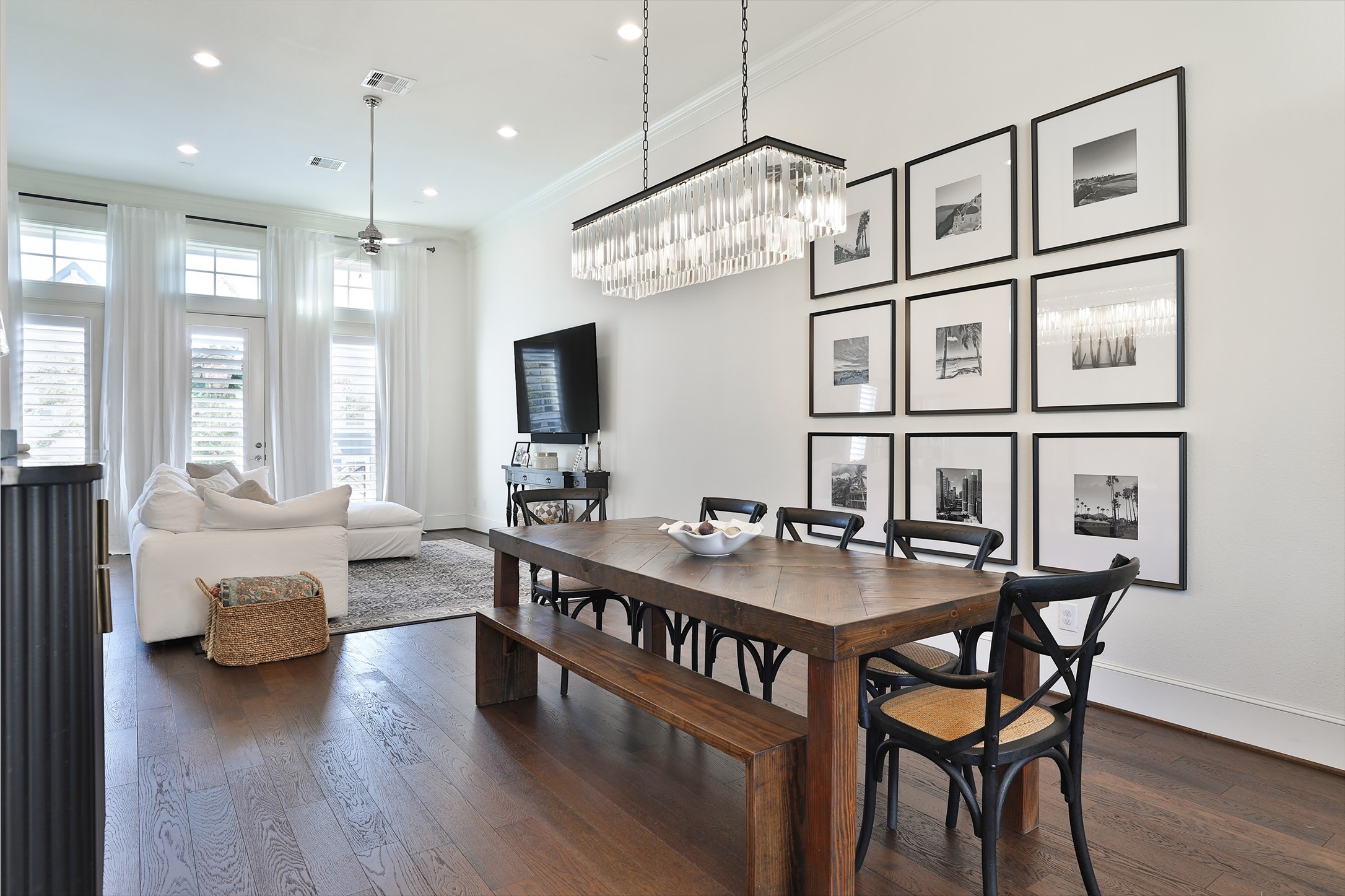 2303 Kolbe Run Lane Houston, TX 77080 - Photo 15 of 35 Experience seamless entertaining in this inviting space where a full dining table comfortably fits, bridging the elegance of the kitchen with the warmth of the family room.