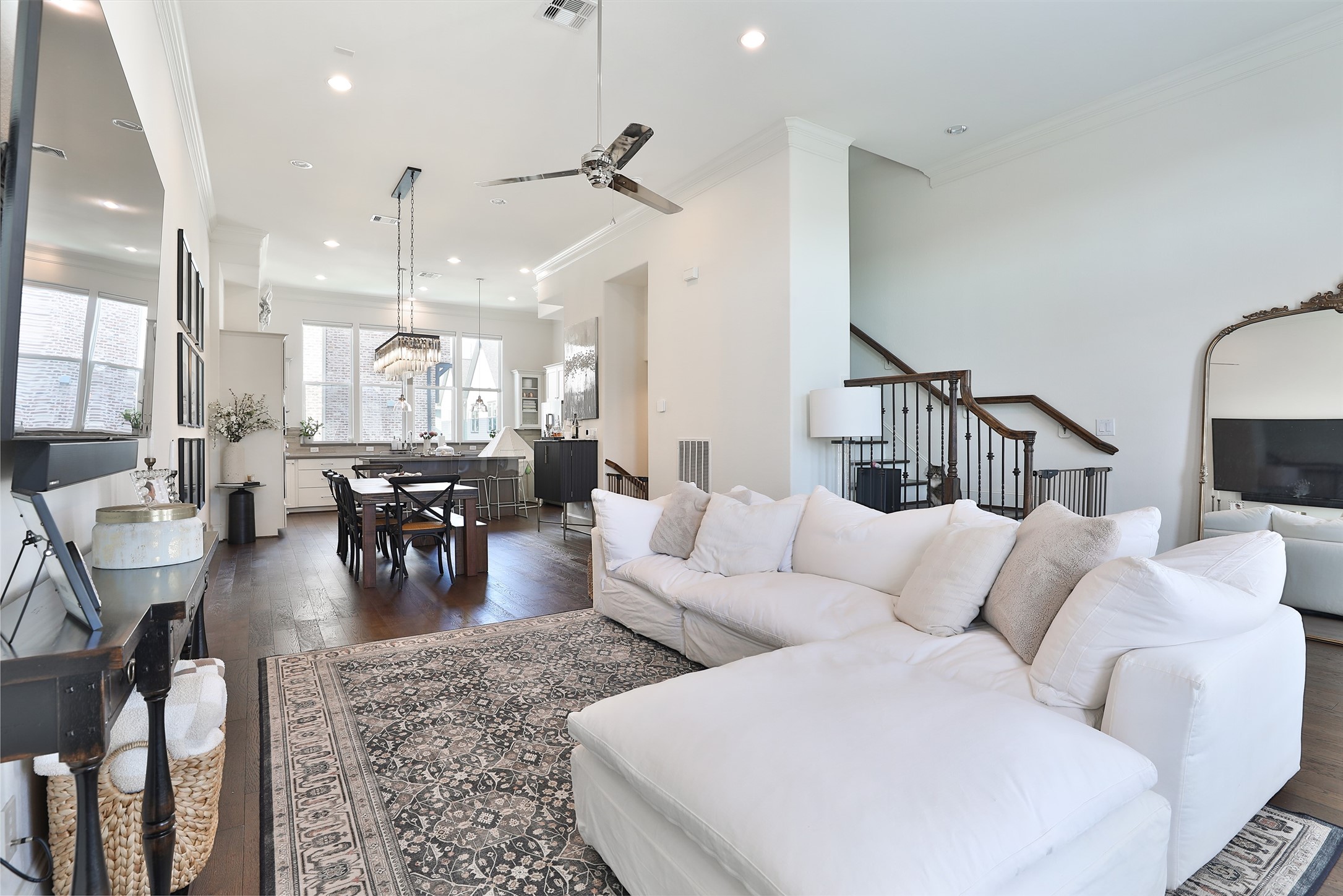 2303 Kolbe Run Lane Houston, TX 77080 - Photo 17 of 35 This inviting family room offers the perfect balance—close enough to the kitchen for lively conversations yet far enough for culinary peace.