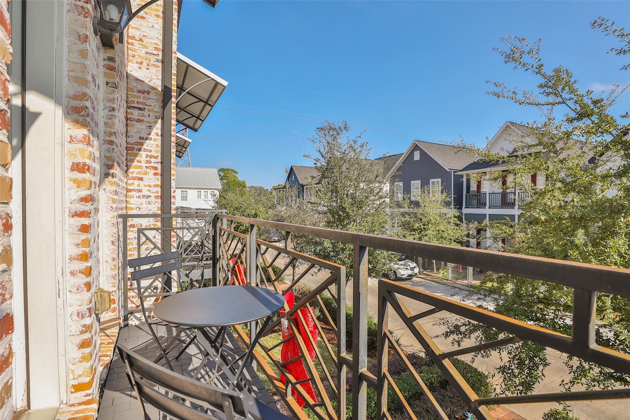 2303 Kolbe Run Lane Houston, TX 77080 - Photo 20 of 35 Wake up to
mornings on your charming second-floor balcony, perfect for savoring your coffee with a view.