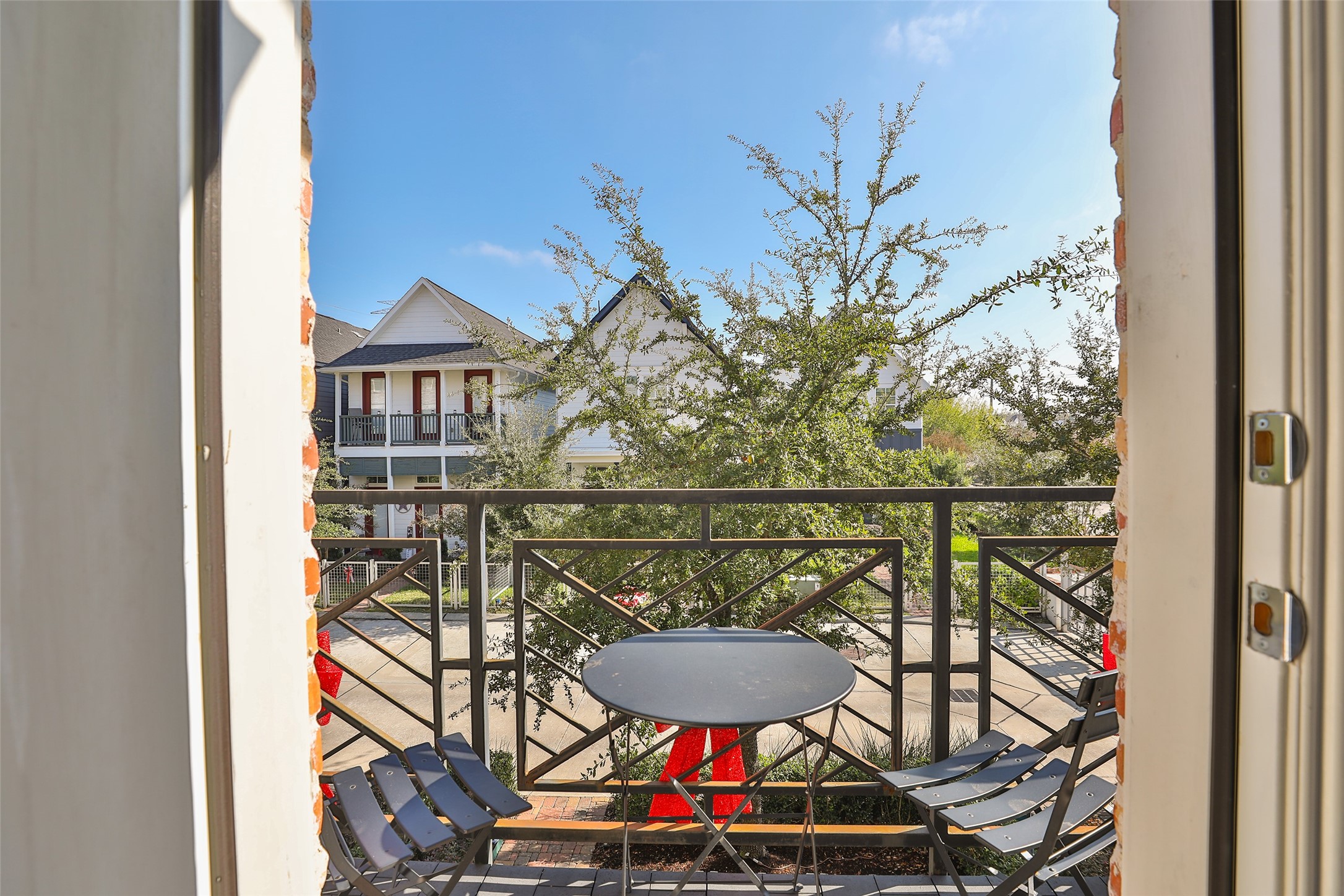 2303 Kolbe Run Lane Houston, TX 77080 - Photo 21 of 35 Surround yourself with the ambiance of Oak trees and lush landscaping below.